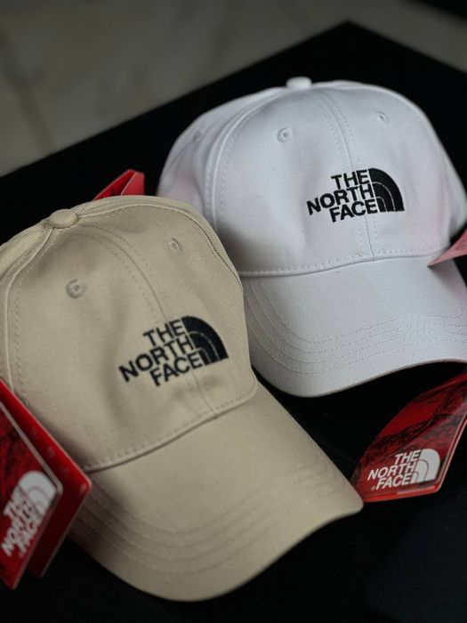 Кепки від бренду The North Face