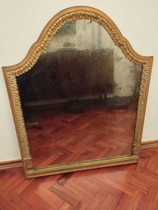 Espelho antigo em talha dourada