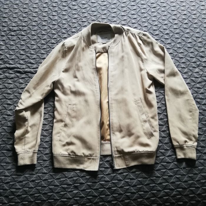Casacos Zara Nike Emídio Tucci