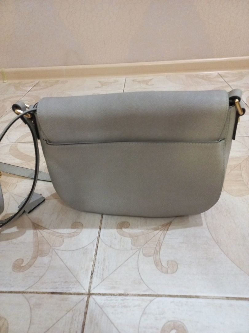 Продается женская,новая,кожанная,серая сумка Michael Kors.