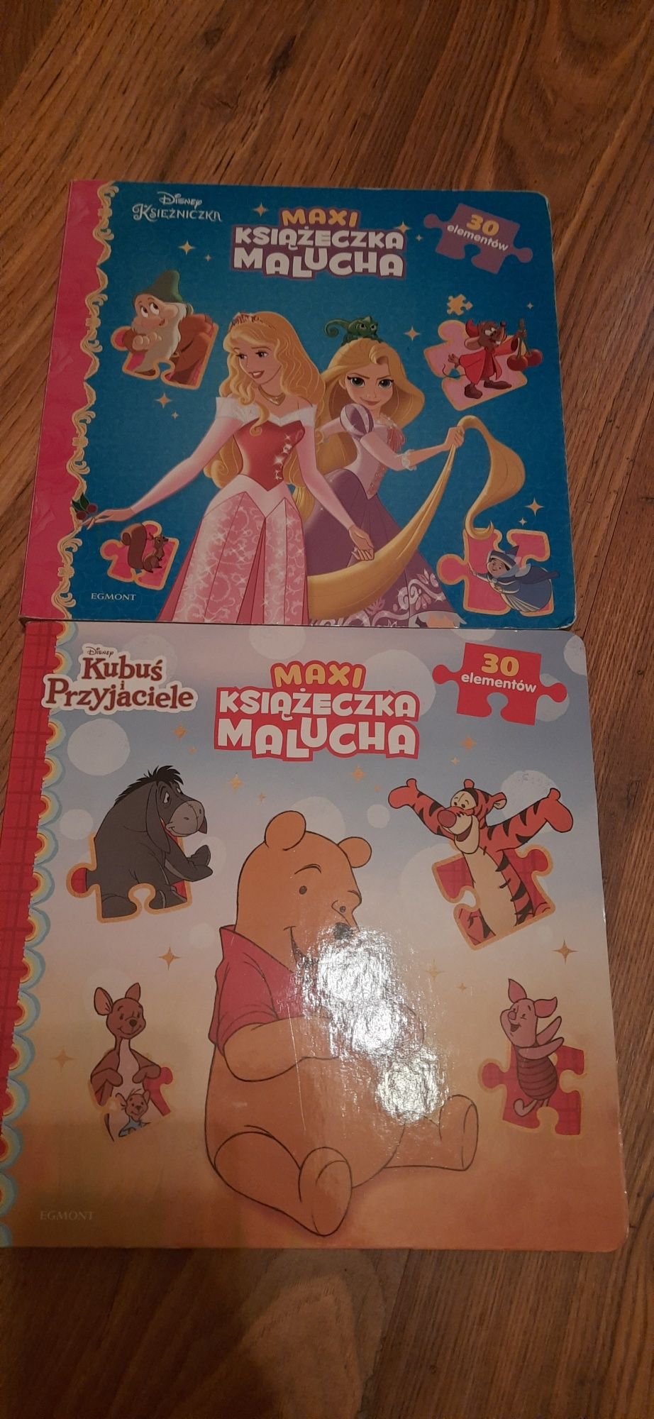 Książki puzzle kubuś puchatek księżniczki