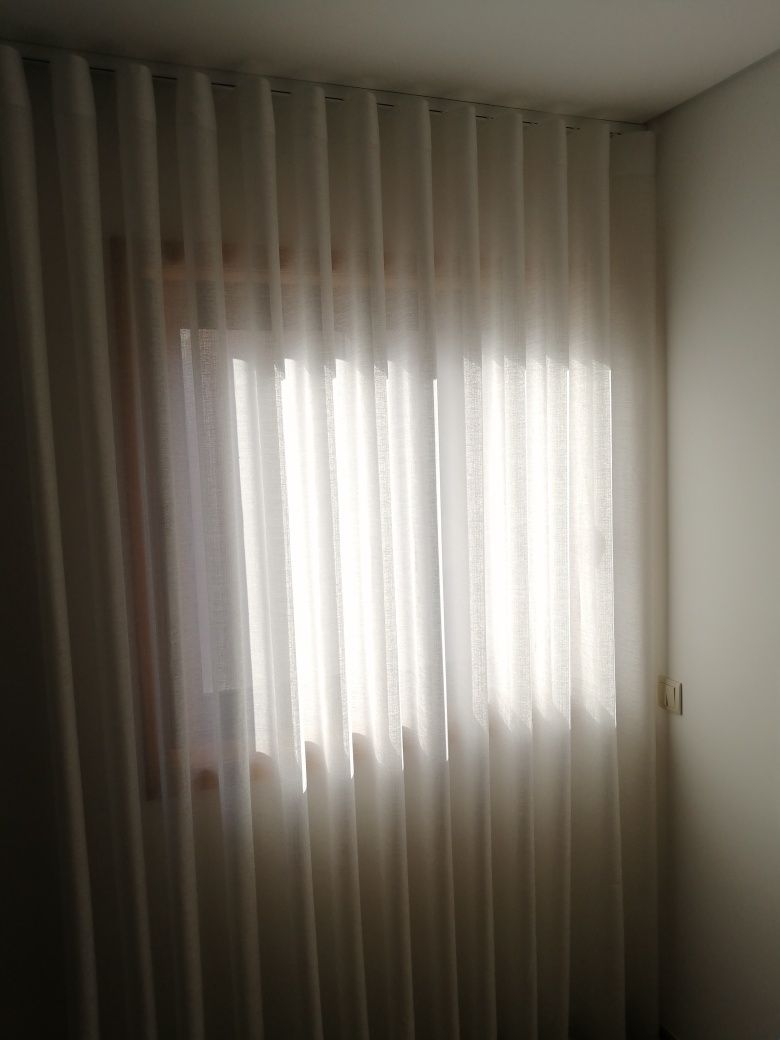 Cortinados usado como novo