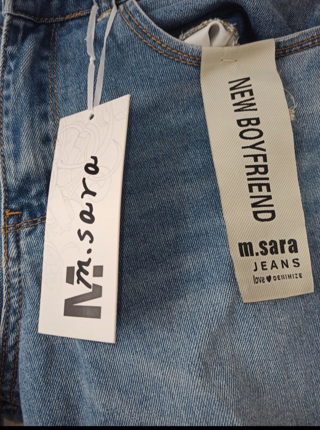 Nowe spodnie jeansy M Sara