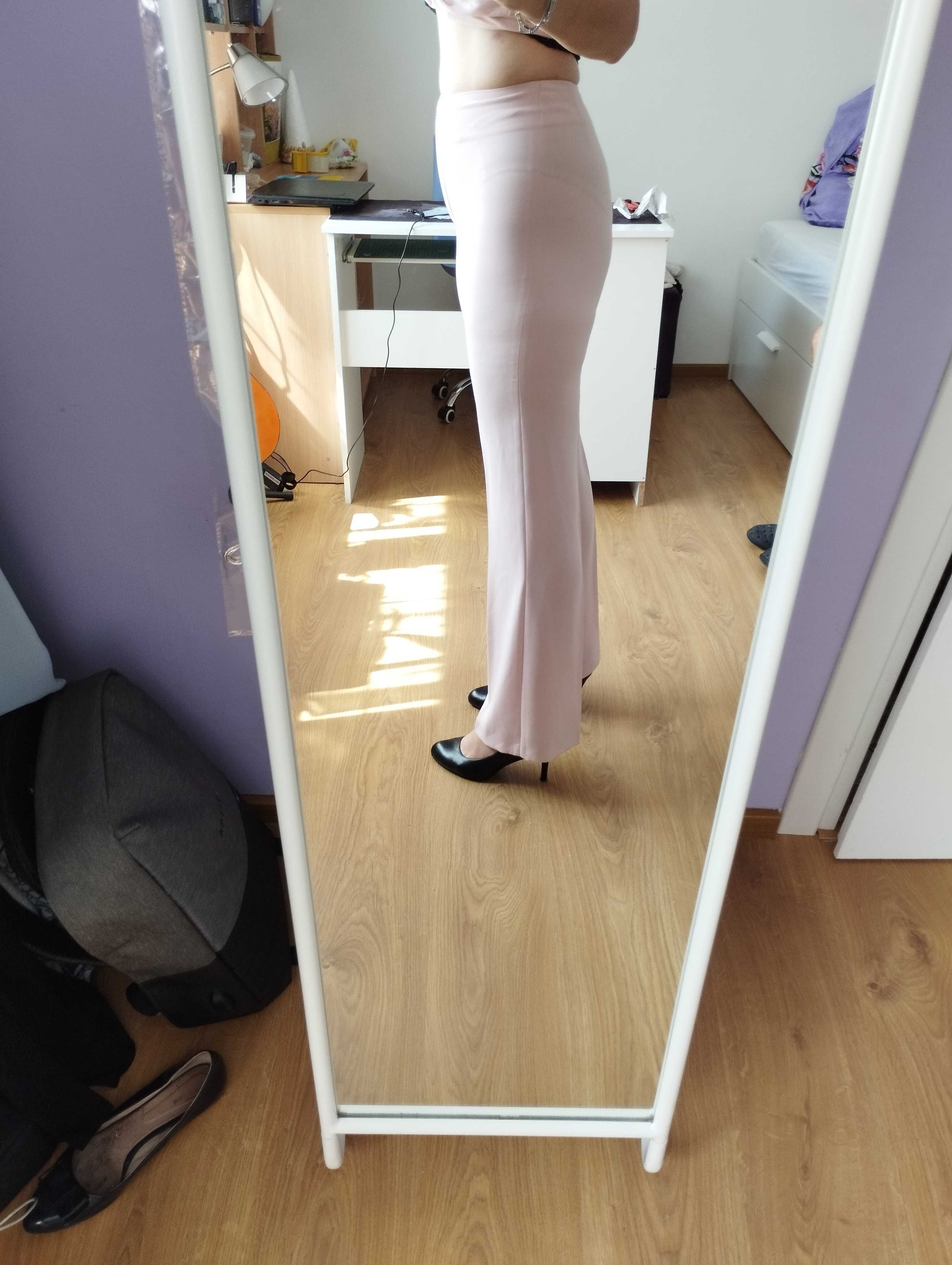Spodnie eleganckie jasno różowe 38