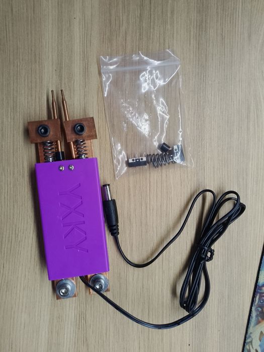 Ручка для точкової зварки з встроєною кнопкою