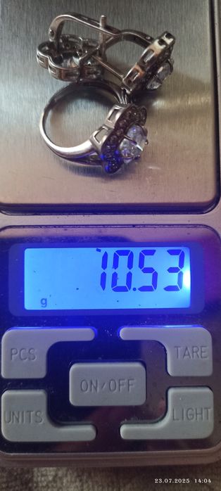 Кольцо и серьги 925 пробы с церкониями заводское