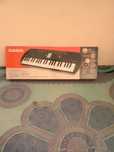 Mini órgão Casio SA-77