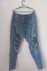 Jasno niebieskie jeansy z rozdarciami H&M rozm. 48