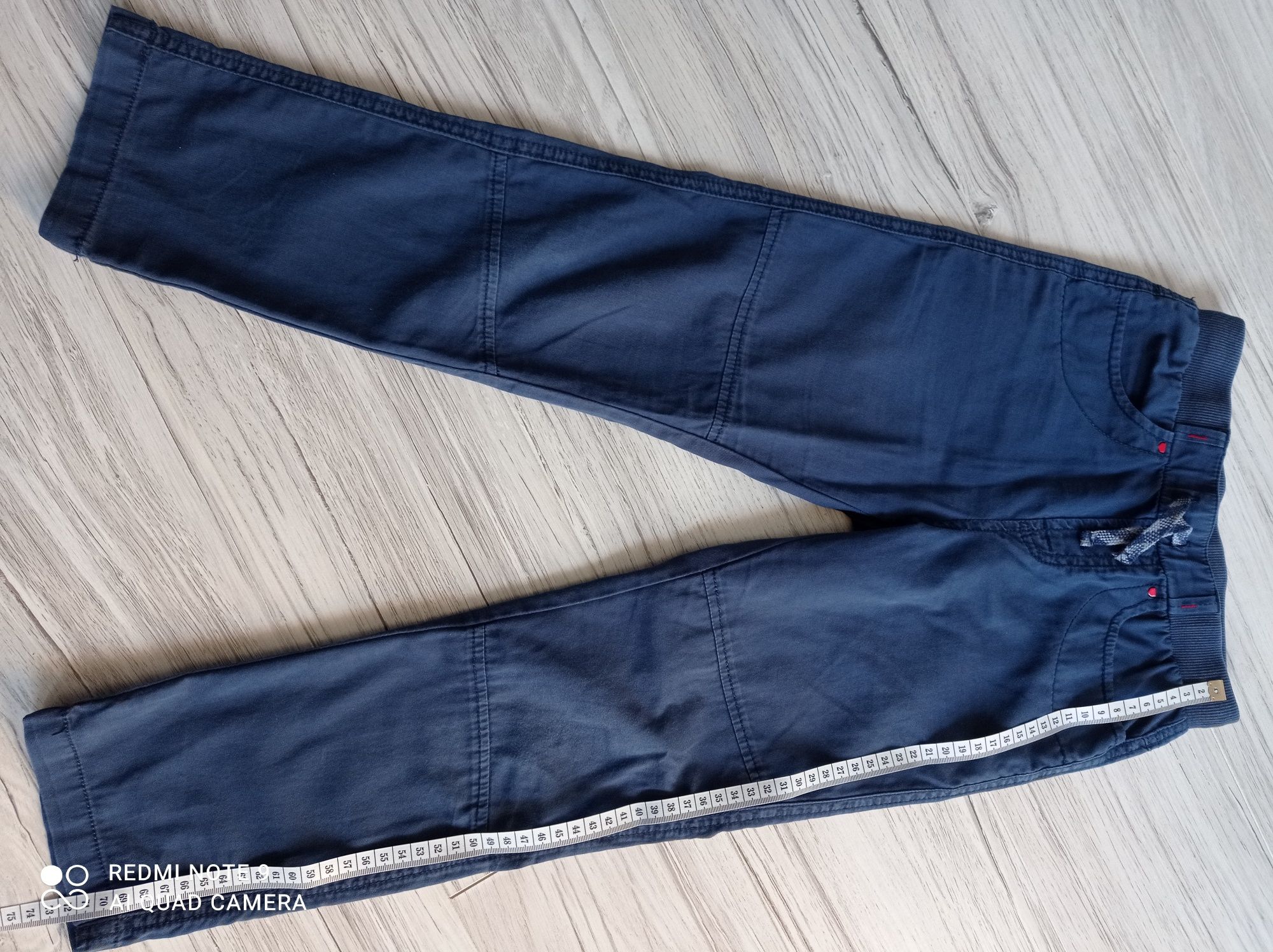 Niebieskie spodnie na gumce Coccodrilo, r. 116
