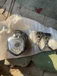 Przednia lampa motocyklowa z mocowaniem