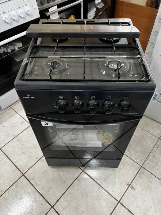 Плита газова Грета сірого кольору ,нова