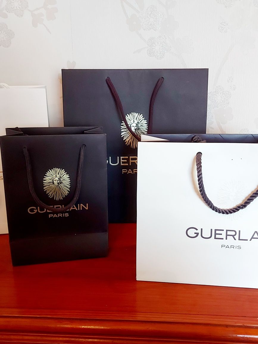 Sacos da marca Guerlain