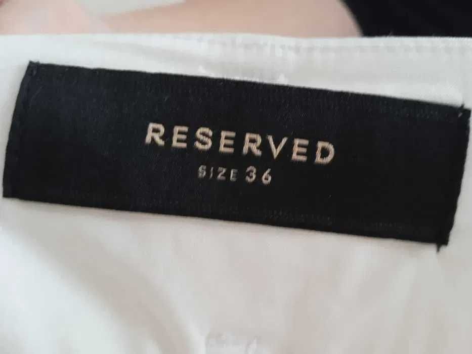 Sprzedam białe spodnie roz 36; Reserved