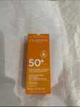 Clarins krem do twarzy z filtrem spf 50+ 30 ml