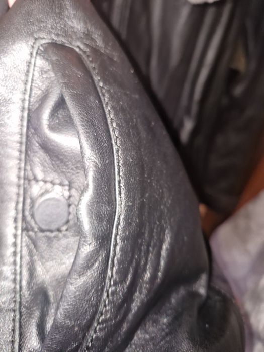 Шкіряна куртка жіноча,розміо 52-54 .