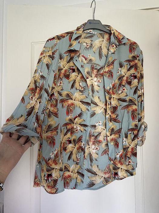 Várias camisas de vários tamanhos