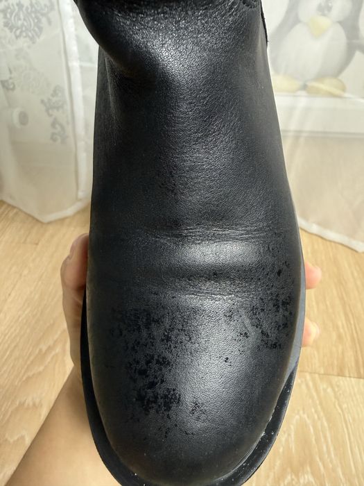 Высокие кожаные сапоги