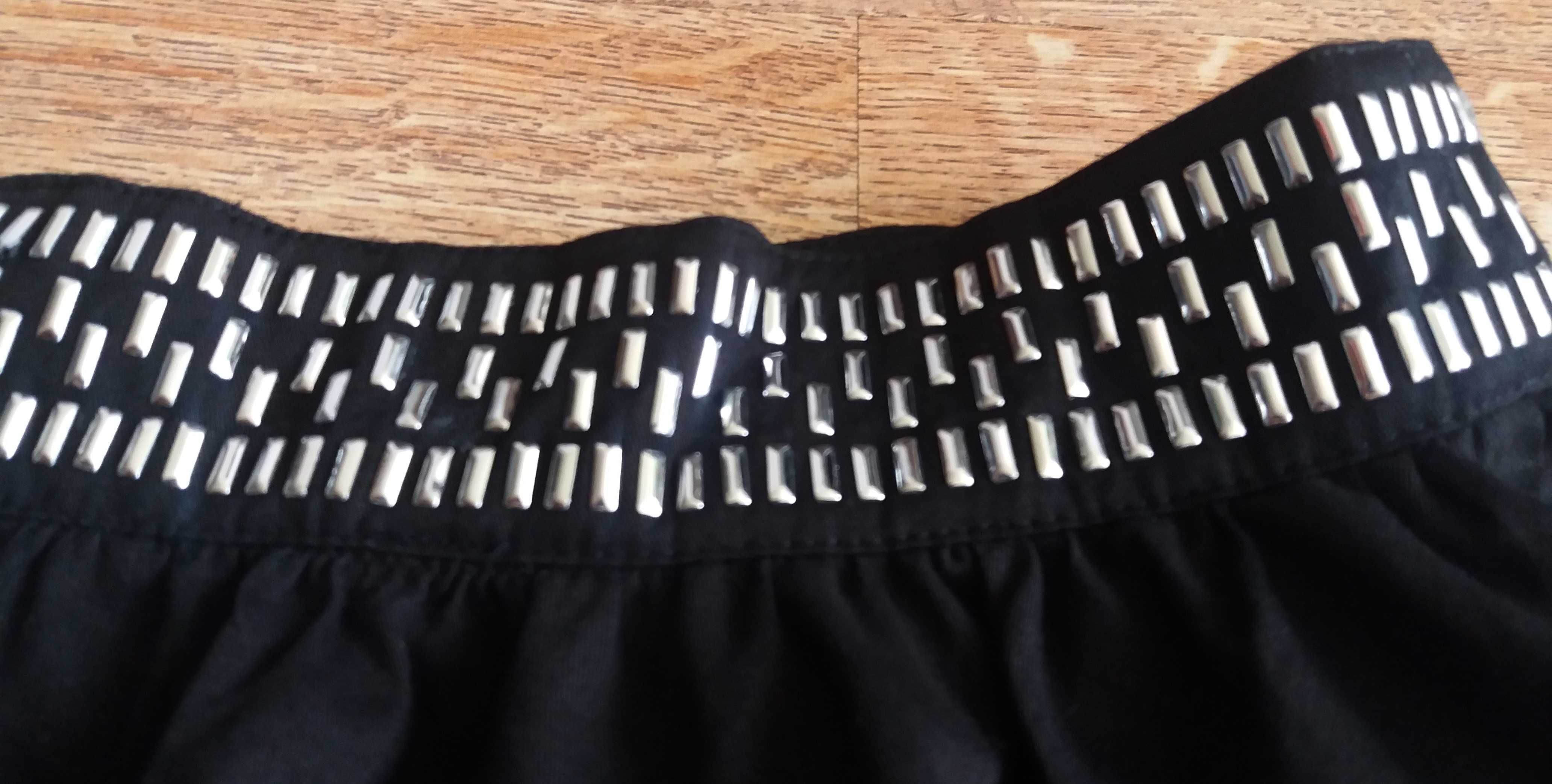 Rozkloszowna spódnica mini z kieszeniami H&M rozmiar 40