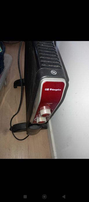 2 Aquecedores a luz um de parede