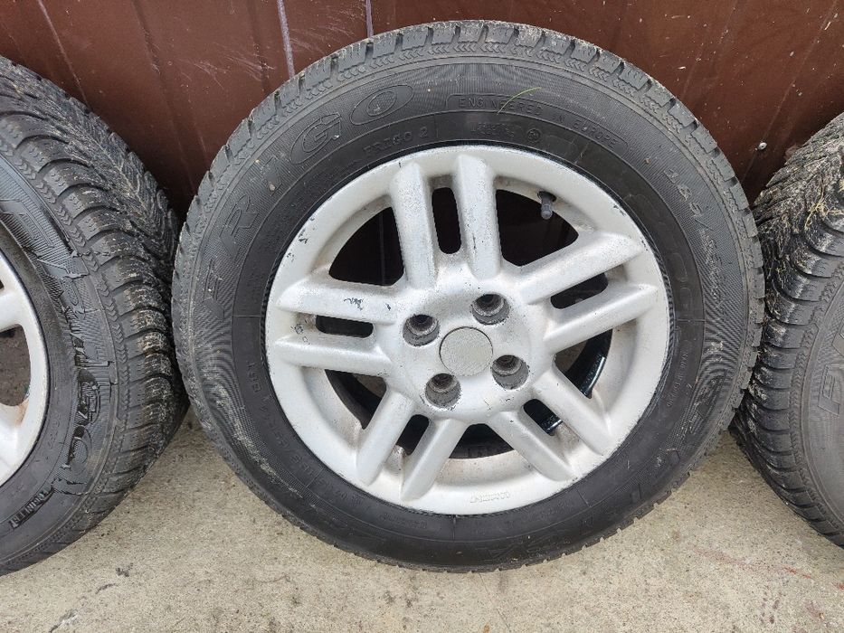 Felgi 14 4x100 et37 opony 185/65/r14 Dębica z opla astry