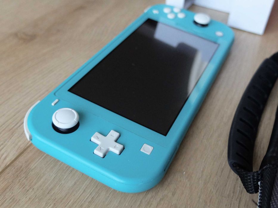Nintendo Switch Lite, completa + mala de transporte Nintendo.