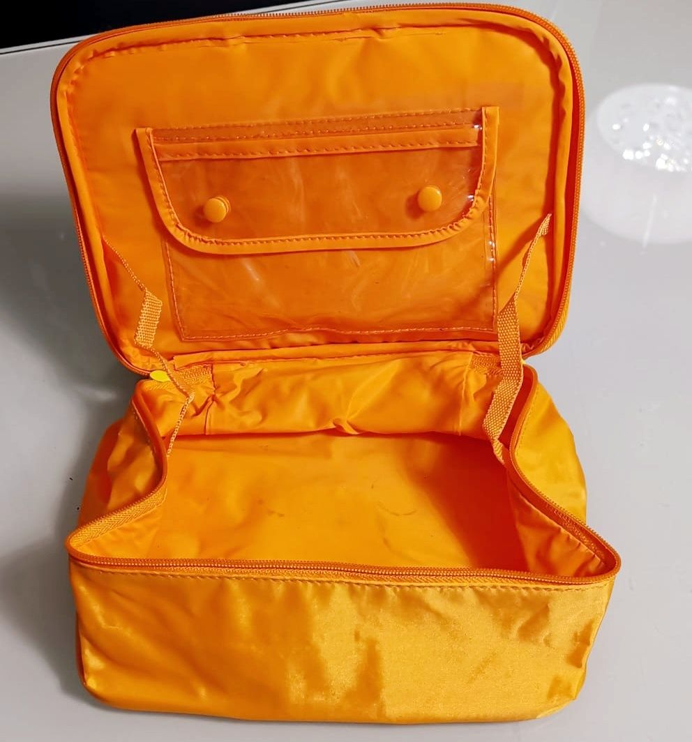 Pomarańczowa kosmetyczka podróżna w paseczki, Avon