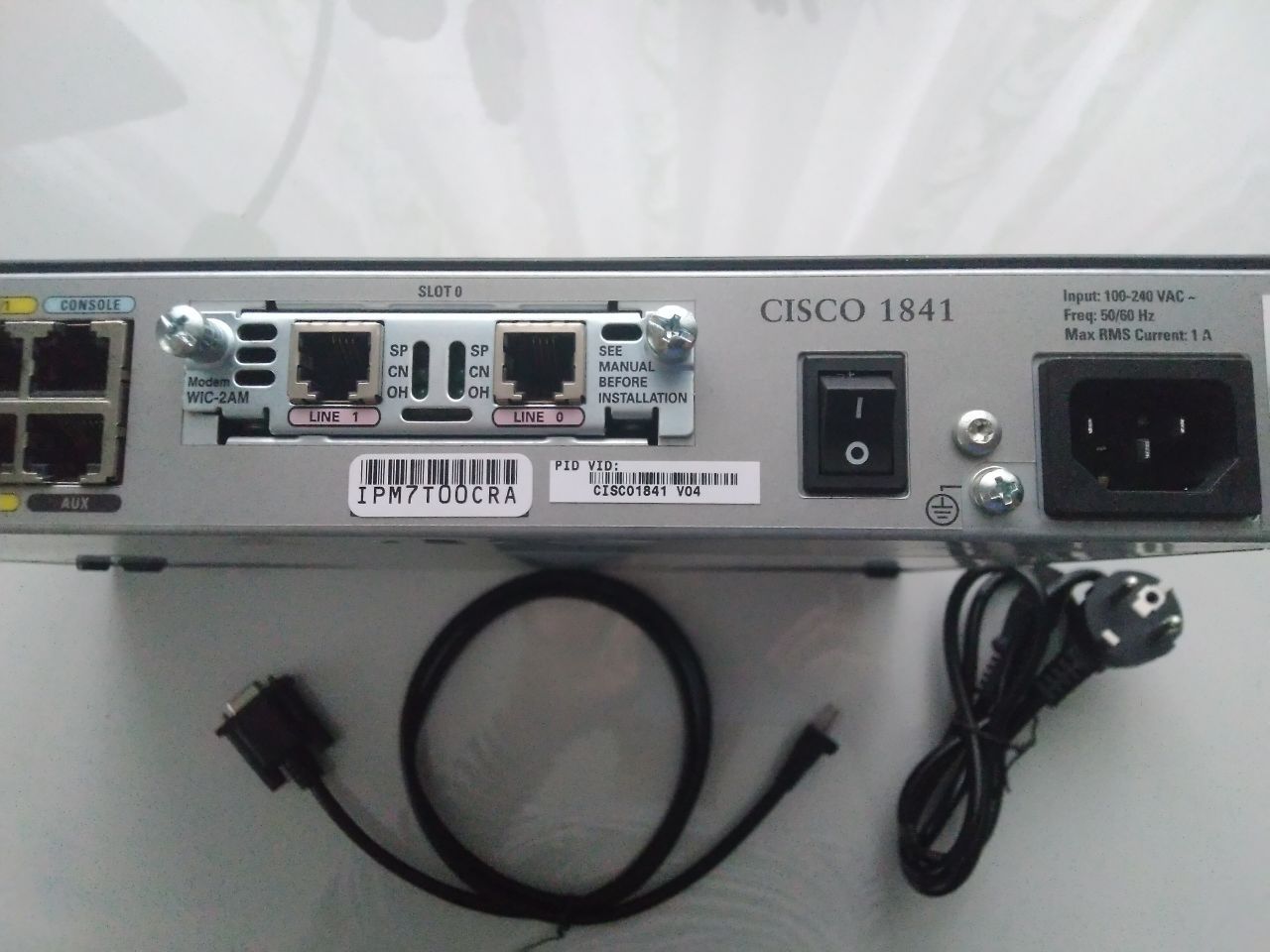 Маршрутизатор Cisco 1841 з модулями Cisco HWIC-4ESW та Cisco WIC-2AM