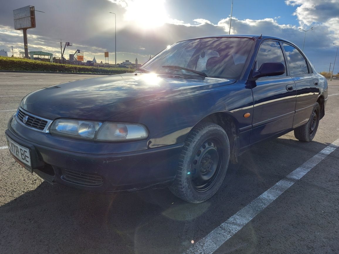 Мазда. Mazda 626 GE 1.8  1996