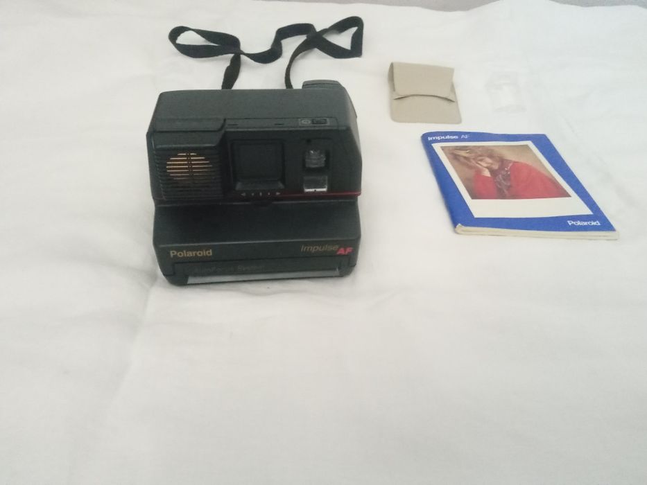 Máquina fotográfica poloroid impulso