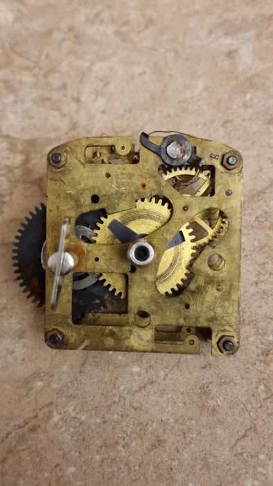 Duży mosiężny zegar z orłem