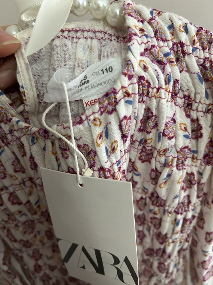 Koszula w kwiatowy wzór bluzka z baskiną dla dziewczynki r.110