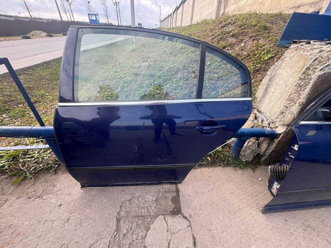 Двері до Skoda SuperB 2004 (ціна за шт.)