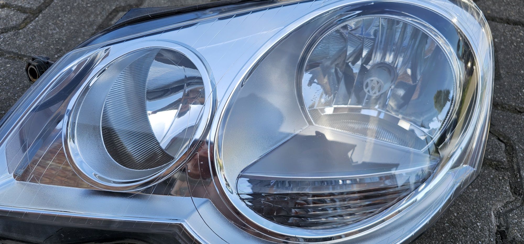 VW polo 2008 rok lampa lewy przód