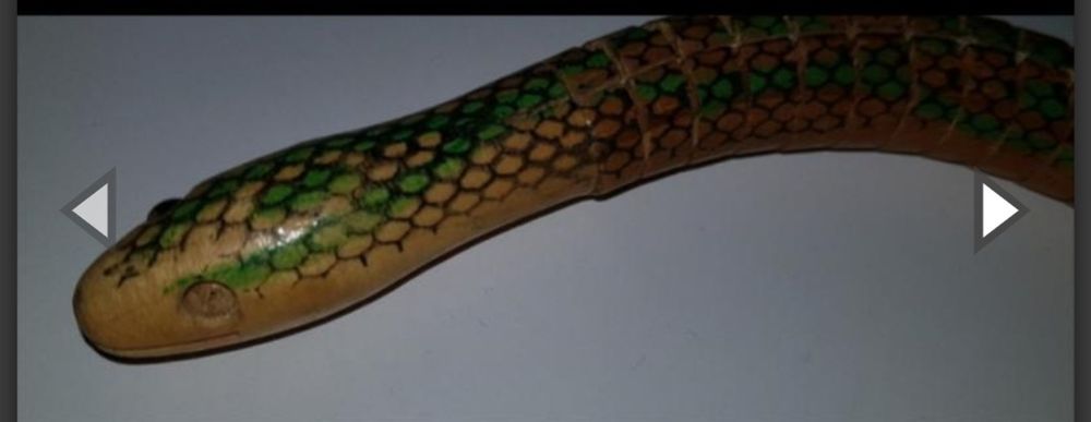 Игрушка змейка из дерева