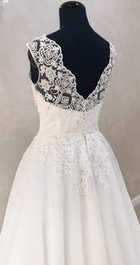 Biała suknia ślubna kształt litery A gorset z koronką i cekinami