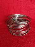 Conjunto de 23 pulseiras em prateado