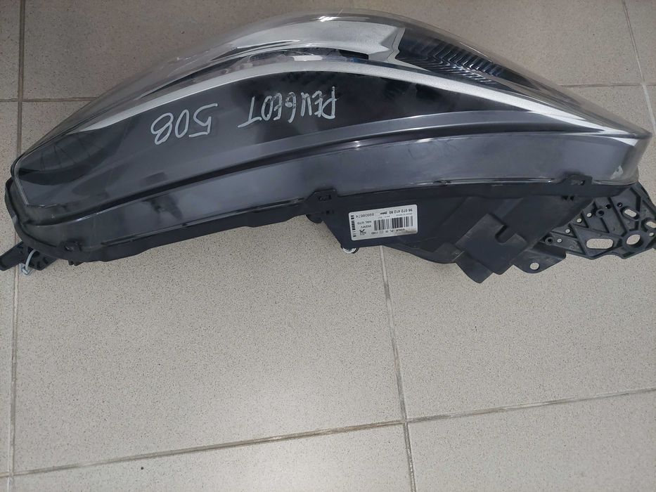 farol esq Peugeot 508