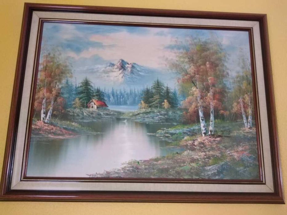 Quadros com paisagens em caixilho de madeira