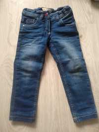 Grube zimowe spodnie jeansy rurki 98 ocieplane