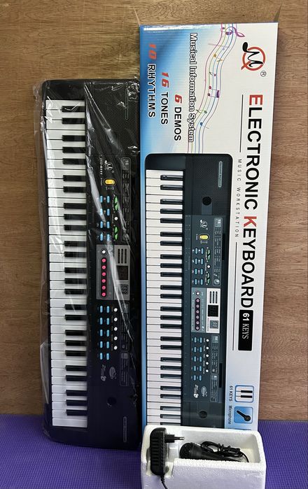 Синтезатор (новий) 61 клавиша для навчання