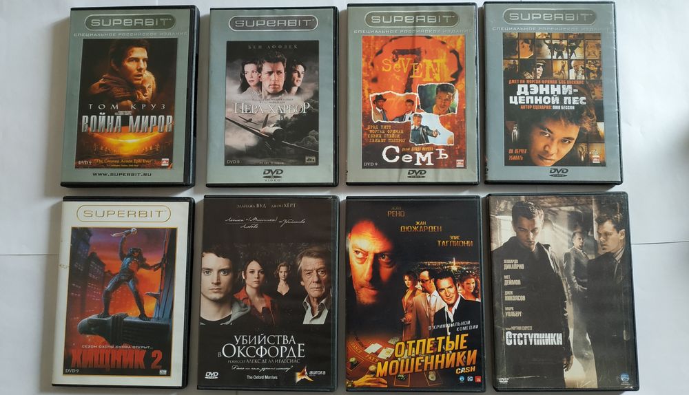 DVD диски с фильмами: Война миров. Беглец. Код Да Винчи  и др.