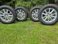 Felgi alu. 17" Mazda, Suzuki z oponami 235/65 R17 Nokian letnie super