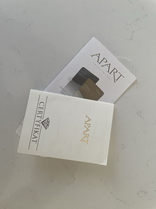 Apart złoty pierścionek z brylantem 1999 pln zaręczynowy