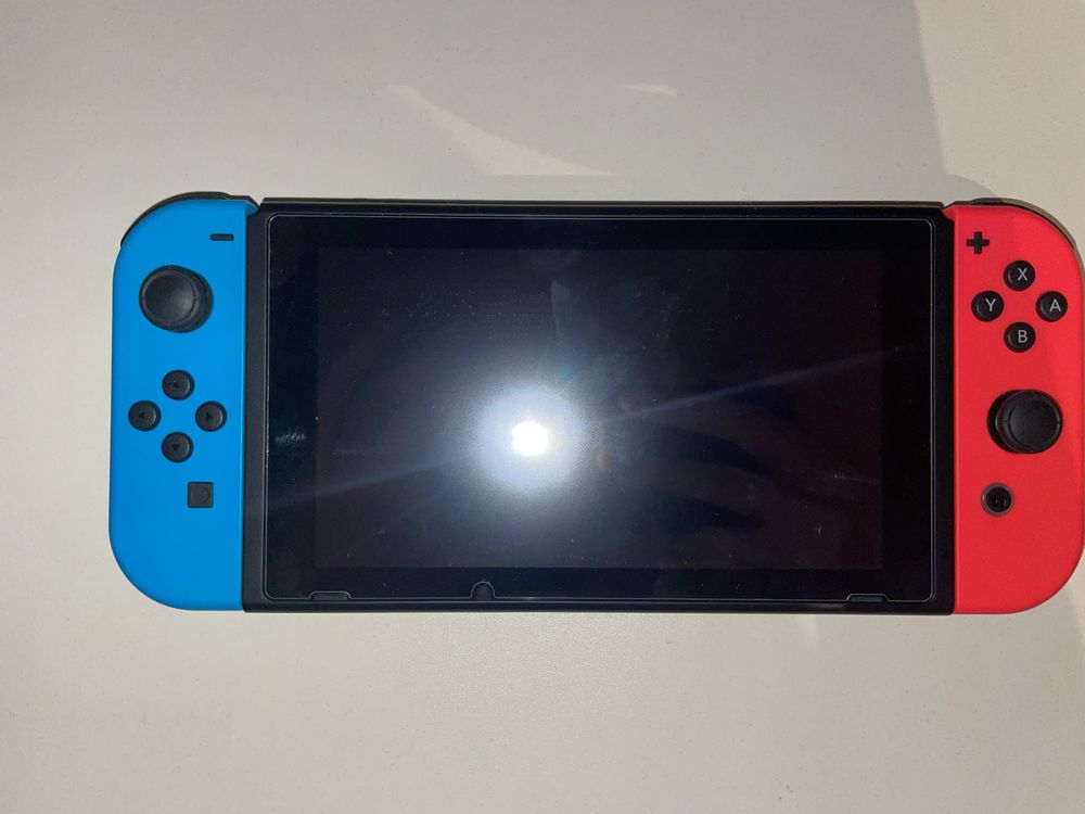 Nintendo Switch v2 + gry + szklo hartowane + pokrowiec