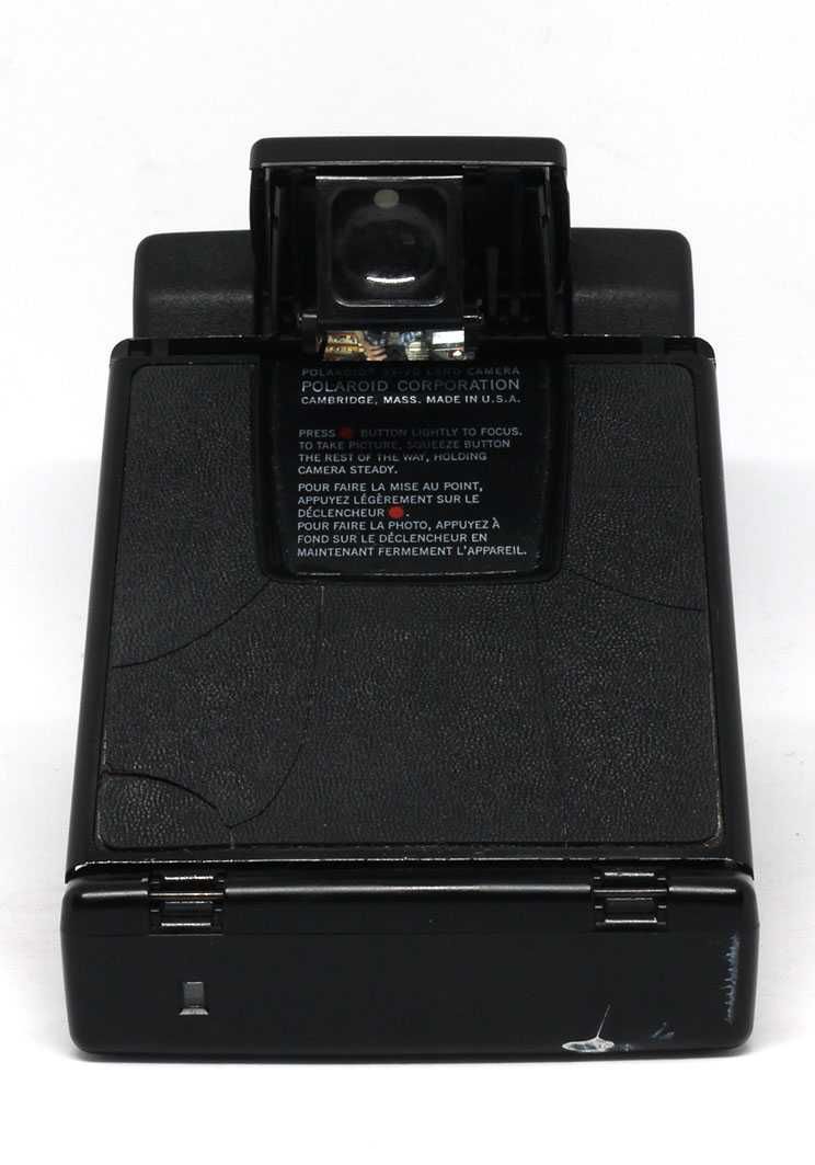 Máquina Polaroid SX-70 Land Camera Supercolor Autofocus Model 2 usada
