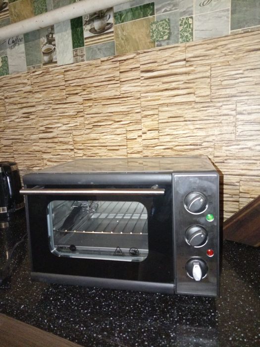 Духовка нова в хорошому стані