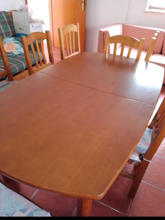 1 mesa extensível mais 11 cadeiras