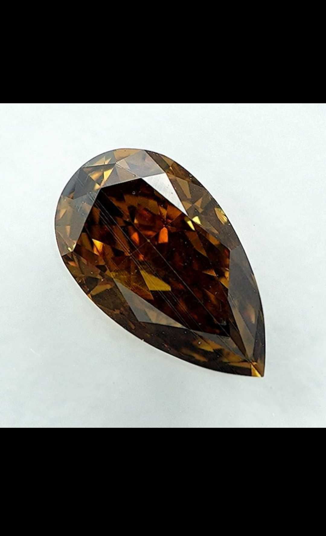 Diament 0,56 ct Fancy Brown Orange Yellow