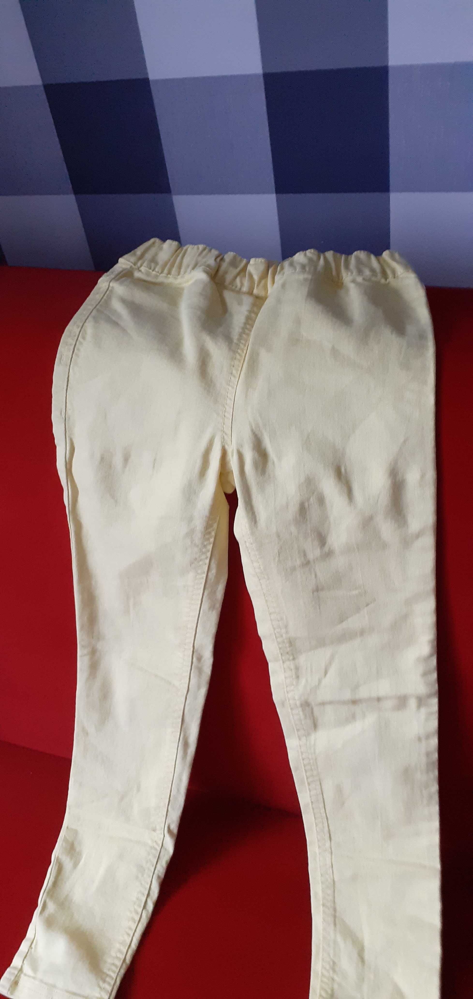 Spodnie jeansy,elastyczne, pastelowe żółte, rozmiar 140