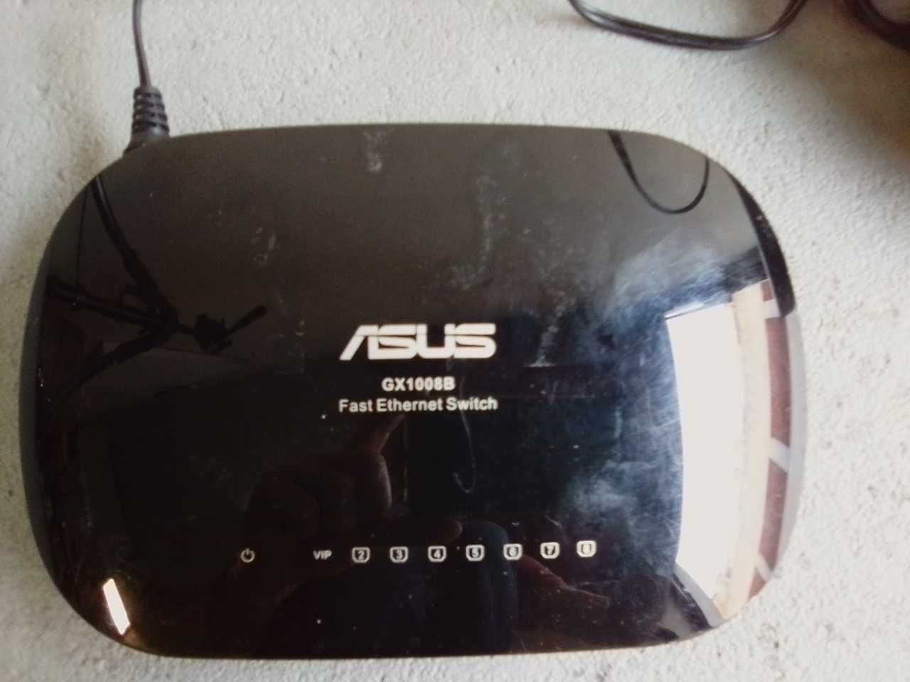 SWITCH ASUS GX1008B 8P 10/100MBPS - Usado